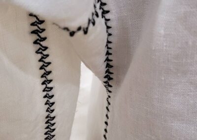 Pentathalon 2025 version of the Eleanor of Toledo dress in ivory silk satin hems photo by Kathryn Wolters