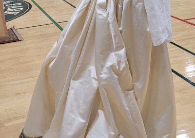 Pentathalon 2025 version of the Eleanor of Toledo dress in ivory silk satin photo by Kathryn Wolters