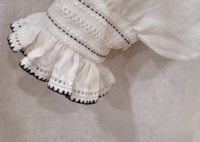 Pentathalon 2025 version of the Eleanor of Toledo dress in ivory silk satin sleeve photo by Kathryn Wolters